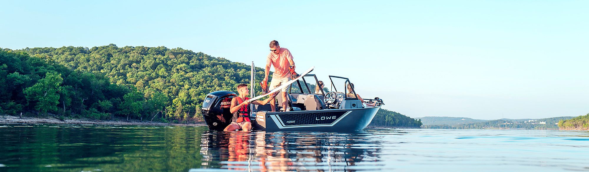 Family of Four on Lowe FS 1625 Fish & Ski Boat, Starboard View